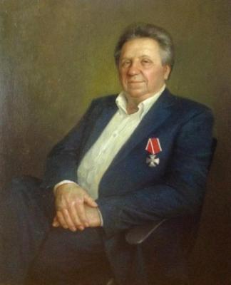 Portrait of a man in a chair. Shustin Vladimir