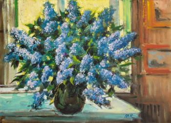 Lilacs by the window in summer