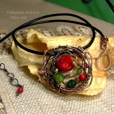 Necklace of copper wire and beads of coral and jade