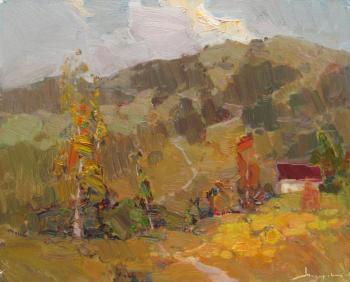 Road in the autumn hills. Makarov Vitaly