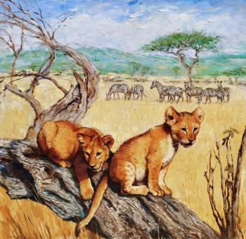 Lion cubs in the savannah. Simonova Olga