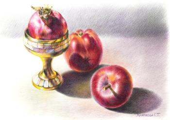 Pomegranate and apples
