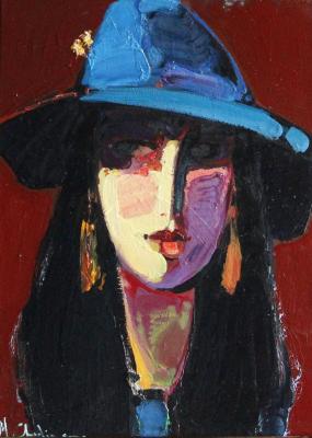 Portrait of a girl in a blue hat. Chatinyan Mger
