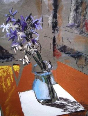 Hyacinths in a glass jar standing on a sheet of white paper. Makeev Sergey