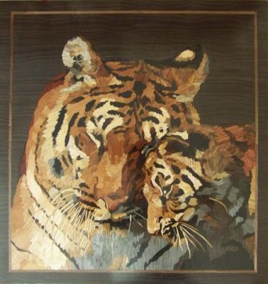 Tigress with tiger cub. Kuznetsov Maxim