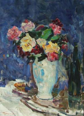 Roses in a white vase. Gremitskikh Vladimir