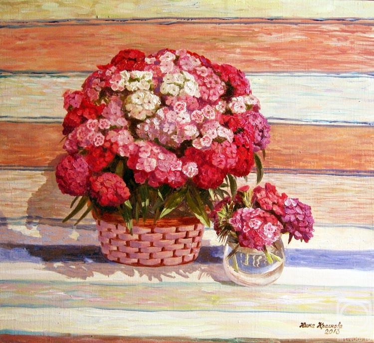 Krasnova Nina. Turkish carnation on background Russian rug