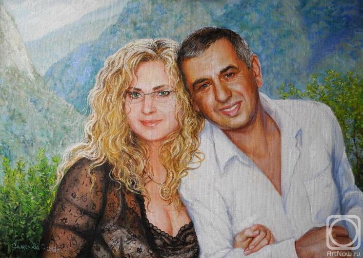 Simonova Olga. Family portrait against mountains