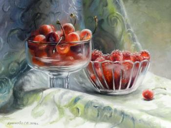 Still life with cherries and raspberries