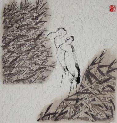 A pair of white herons