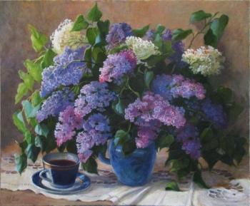 Lilacs in a blue vase and a cup. Shumakova Elena