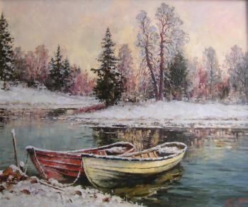 A winter landscape with the boats