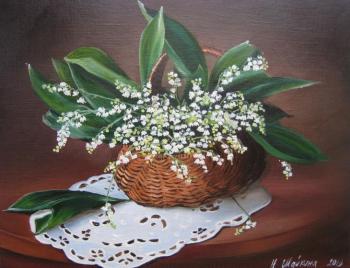 Lilies of the valley in a basket. Shaykina Natalia