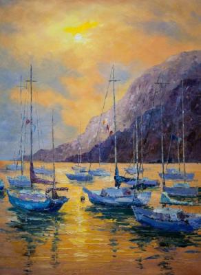 Sailboats at the rocks at sunset. Vevers Christina