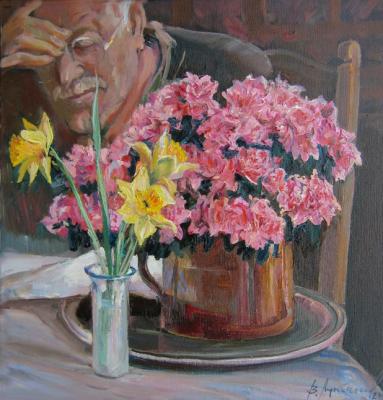 An old man with fresh flowers. Loukianov Victor