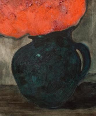 The green jug with a red flowers