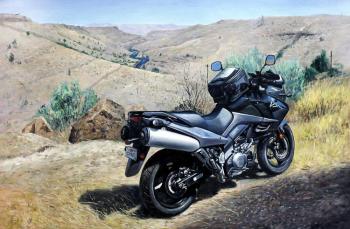 A motorbike in the mountains. Romm Alexandr