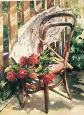 Red roses on a Viennese chair