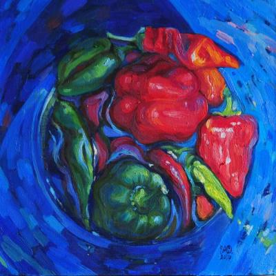 Peppers in a blue bucket or an unknown planet