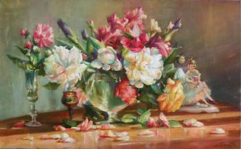 Peonies and irises on the table