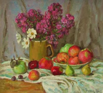 Phlox in a mug and fruit. Rudin Petr