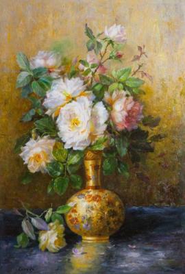 Bouquet of roses in a golden vase