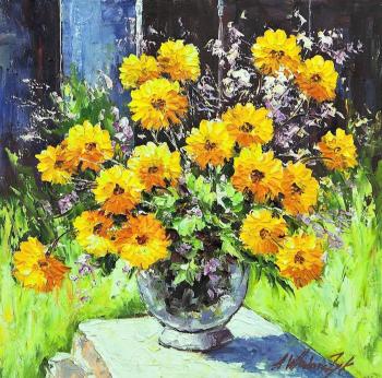 Yellow marigolds in the garden. Vlodarchik Andjei