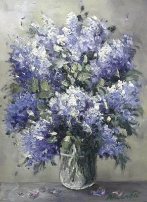 Bouquet of lilac in a glass vase. Vlodarchik Andjei