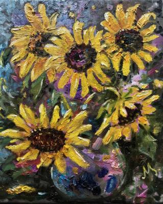 Sunflowers in a blue vase