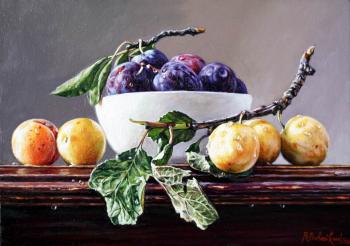 Still life with yellow plums