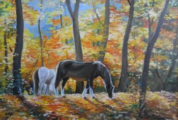 Horses in autumn forest