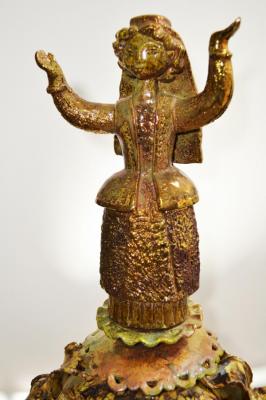 Fragment of lamp with dancing Bashkir