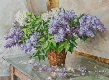 Lilac on the table. Volya Alexander