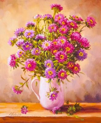 A garden bouquet of asters in a pitcher