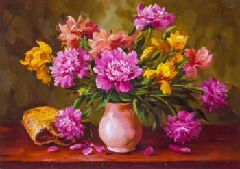 Bouquet of peonies and yellow irises