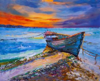 Blue boat on the ocean. Sunset. Rodries Jose