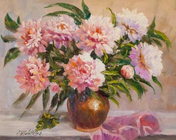 Bouquet of peonies in a clay vase