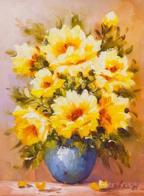 Sunflowers in a blue vase