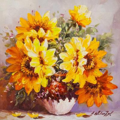 Sunflowers in a round vase
