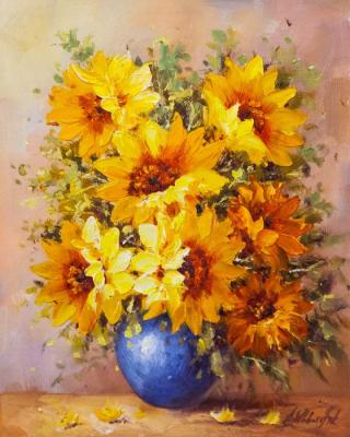 Garden sunflowers in a blue vase