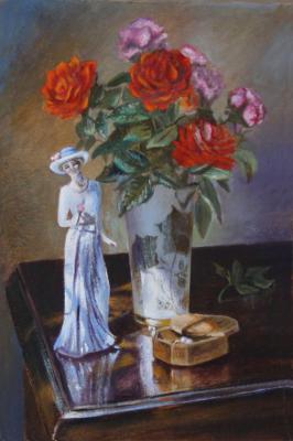 Porcelain figurine and roses