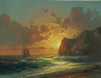 Sailboat at sunset. Koval Vladimir