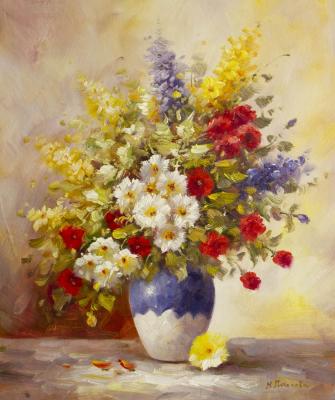 A bouquet of garden flowers in a vase
