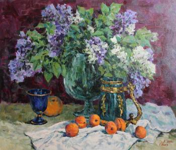 A bouquet of lilac and fruits