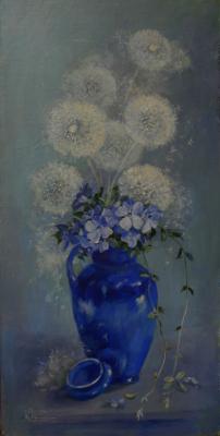 Dandelions in a blue jug
