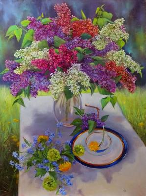 Lilac and forget-me-nots in the garden. Razumova Svetlana