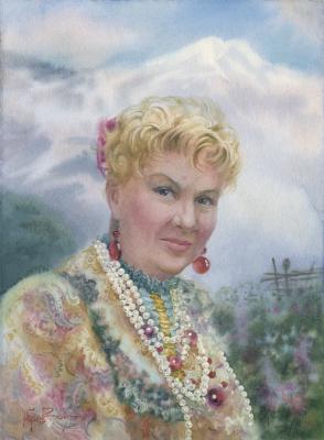 Portrait of a woman on the background of Elbrus