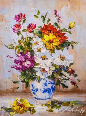 Multi-colored bouquet in a gzhel vase