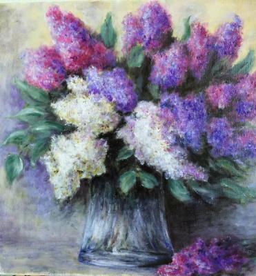 Lilac in a vase on the table. Limanskaya Elena