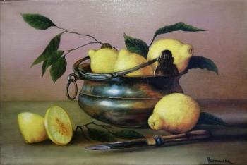 Still life with lemons and a copper cauldron